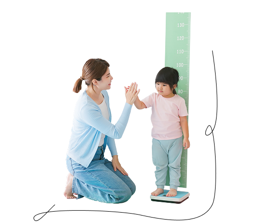 Mom measuring daughters height